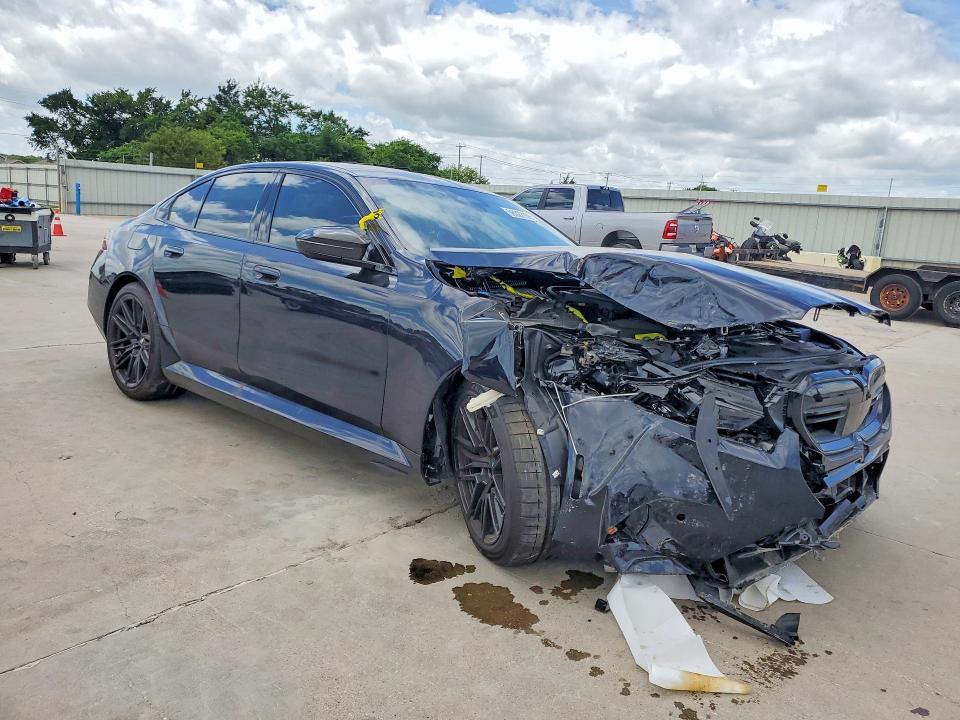 2026 BMW M5 VIN WBS83FK02TCW63513 COPART salvage auction — FRONT END, TX - SALVAGE VEHICLE TITLE, sold $56,500 on 2026-07-09 (photo 4)