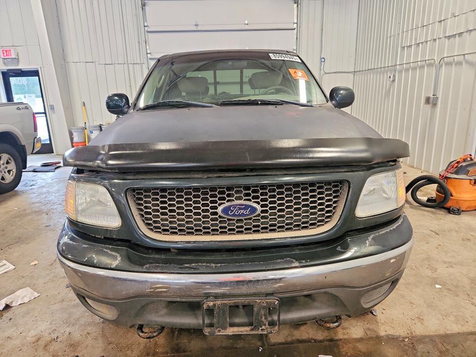 2003 Ford F-150 lightning VIN 1FTRW08LX3KB64336 COPART salvage auction — MECHANICAL, Mn - Cert Of Title-Prior Salvage, sold $800 on 2026-07-09 (photo 5)