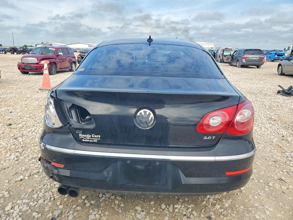 2012 Volkswagen VIN WVWMN7AN1CE538834 COPART salvage auction — REAR END, Tx - Salvage Vehicle Title, sold $325 on 2026-08-13 (photo 6)