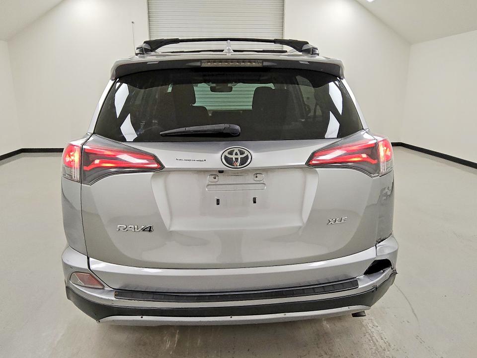 2018 Toyota Rav4 VIN JTMWFREV6JJ194806 COPART salvage auction — REAR END, TX - CERTIFICATE OF TITLE, sold $6,300 on 2026-07-14 (photo 6)