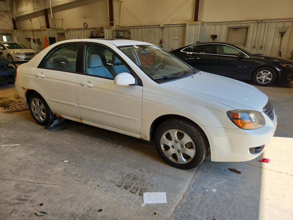 2009 Kia Spectra VIN KNAFE221795613517 COPART salvage auction — HAIL, Wi - Certificate Of Title, sold $275 on 2026-07-08 (photo 4)