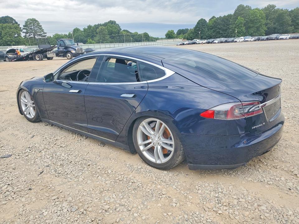 2013 Tesla Model s VIN 5YJSA1CG8DFP04863 COPART salvage auction — SIDE, Ar - Certificate Of Title (P), sold $2,100 on 2026-07-16 (photo 2)