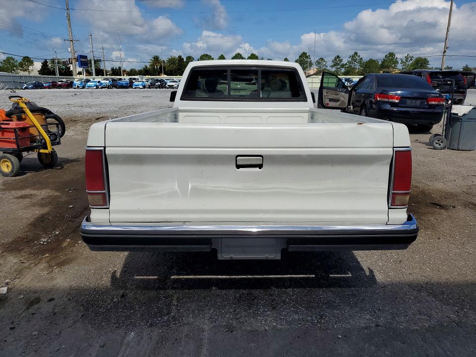 1989 Chevrolet S truck VIN 1GCCS14Z7K2277161 COPART salvage auction — UNDERCARRIAGE, Fl - Cert Of Title Slvg Rebuildable, sold $1,200 on 2026-07-06 (photo 6)