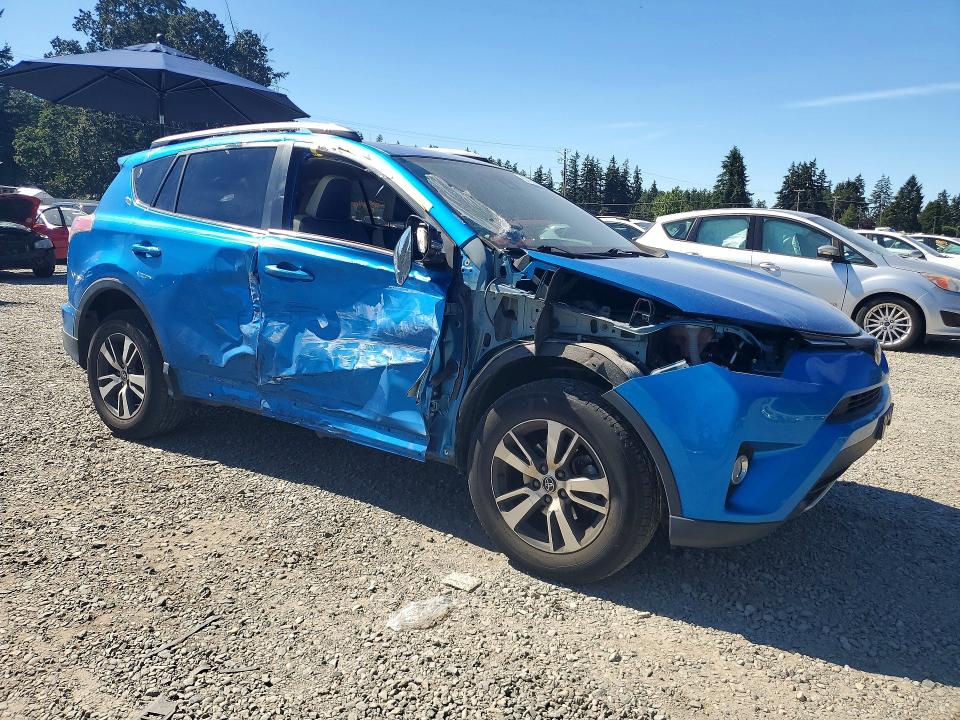 2018 Toyota Rav 4 VIN JTMRFREV1JJ192183 COPART salvage auction — SIDE, Salvage Title, sold $450 on 2026-07-21 (photo 4)
