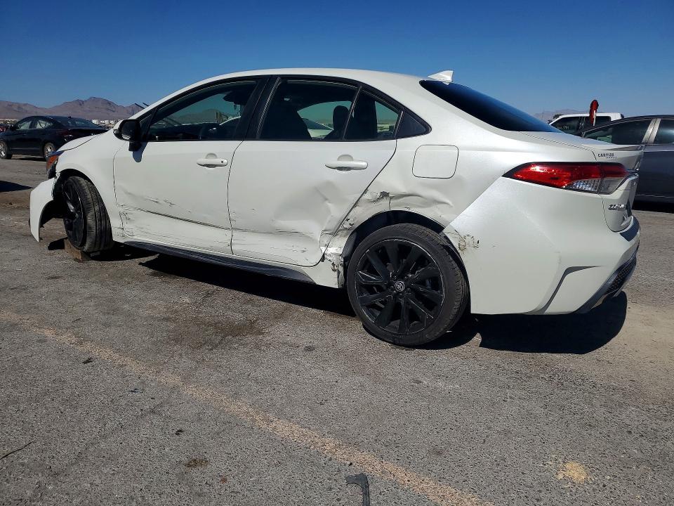 2021 Toyota Corolla VIN JTDS4MCE2MJ075701 COPART salvage auction — SIDE, Nv - Salvage Title, sold $6,300 on 2026-07-23 (photo 2)