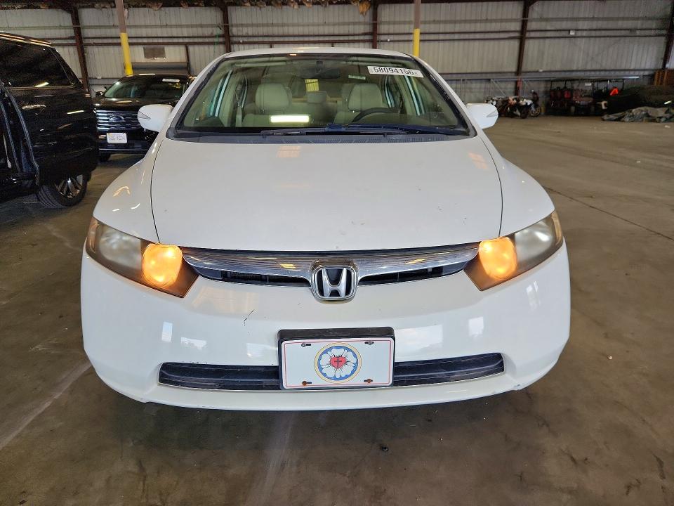 2006 Honda Civic hybrid VIN JHMFA36256S003389 COPART salvage auction — WATER/FLOOD, Fl - Cert Of Title-Flood & Rebuilt, sold $375 on 2026-07-13 (photo 5)