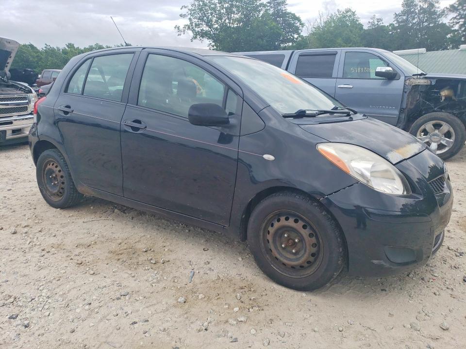 2009 Toyota Yaris VIN JTDKT903795230729 COPART salvage auction — REAR END, MA - CERT OF TITLE-RECONSTRCTD COLL, sold $375 on 2026-07-22 (photo 4)