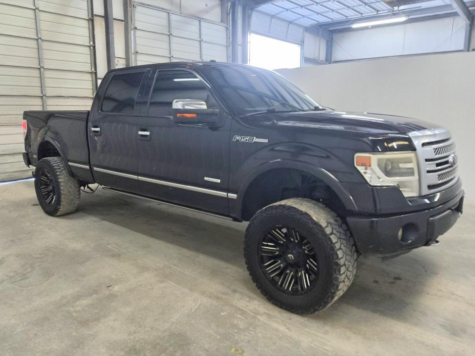 2014 Ford F-150 lightning VIN 1FTFW1ET4EFA61793 COPART salvage auction — MINOR DENT/SCRATCHES, TX - CERTIFICATE OF TITLE, sold $5,100 on 2026-07-09 (photo 4)