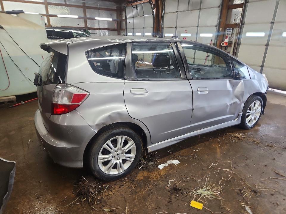 2009 Honda Fit VIN JHMGE88409S029391 COPART salvage auction — ROLLOVER, IL - JUNKING CERT OF A VEHICLE, sold $175 on 2026-07-13 (photo 3)