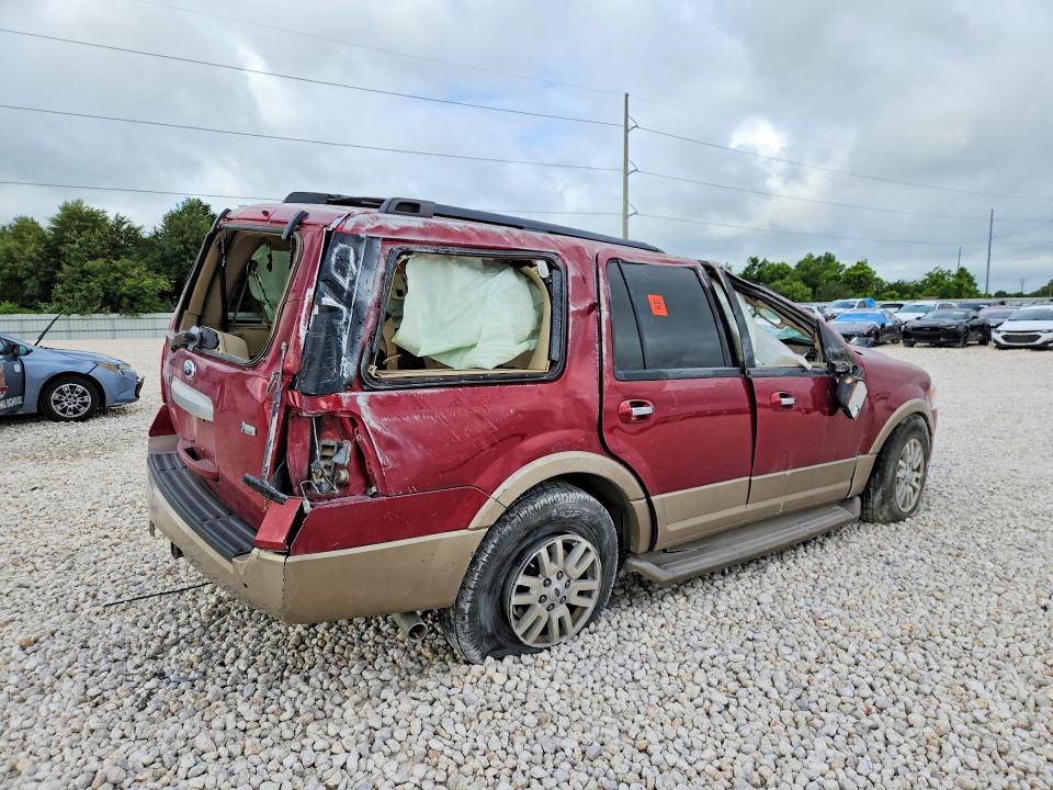 2014 Ford VIN 1FMJU1J56EEF18418 COPART salvage auction — ROLLOVER, Tx - Salvage Vehicle Title, sold $600 on 2026-07-02 (photo 3)