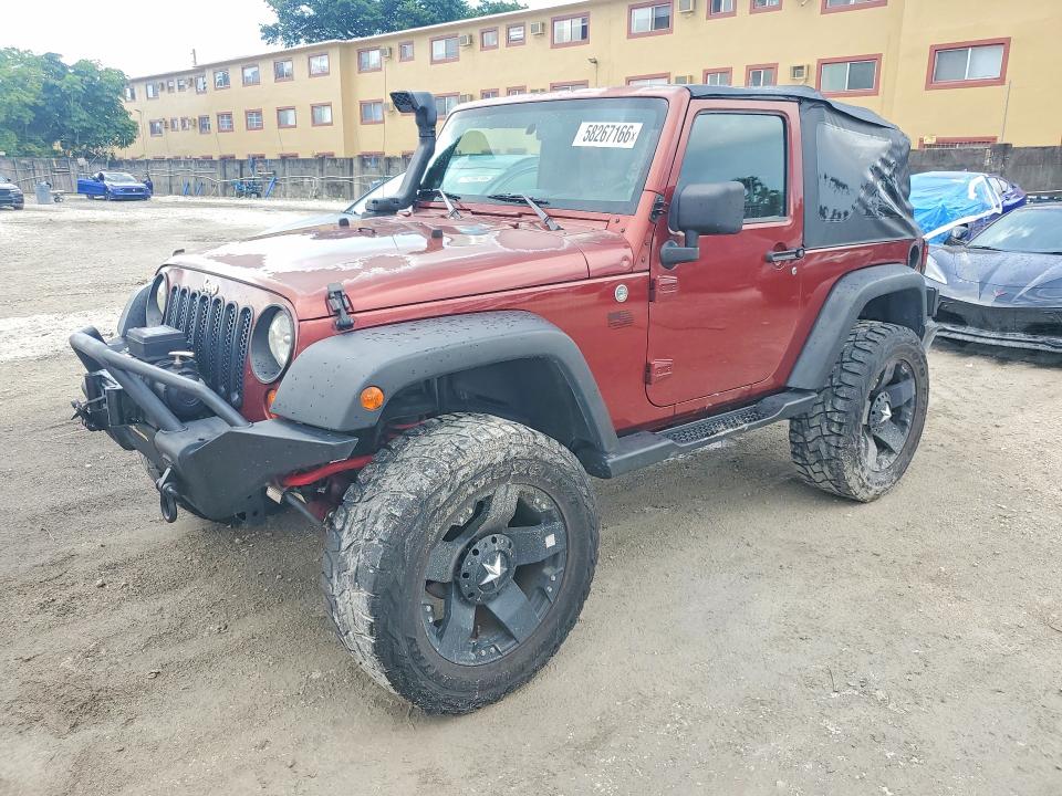 2010 Jeep Wrangler / VIN 1J4AA2D16AL119780 COPART salvage auction — MINOR DENT/SCRATCHES, Fl - Certificate Of Title (P), sold $4,700 on 2026-07-09 (photo 1)