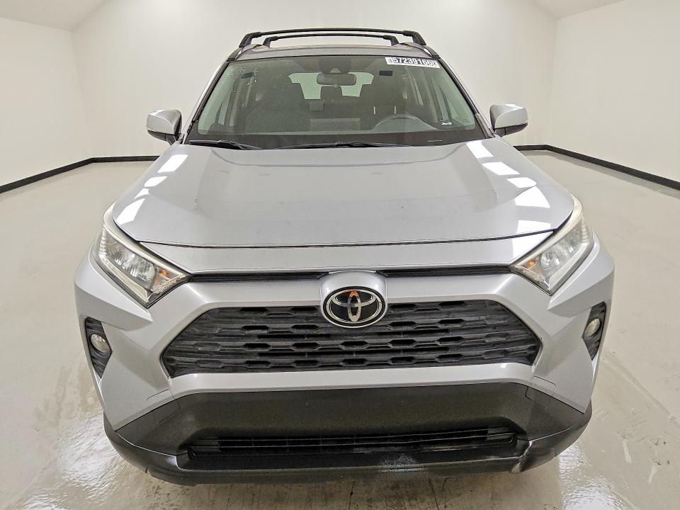2019 Toyota Rav4 VIN JTMW1RFVXKD032156 COPART salvage auction — MINOR DENT/SCRATCHES, Tx - Certificate Of Title, sold $17,200 on 2026-07-09 (photo 5)