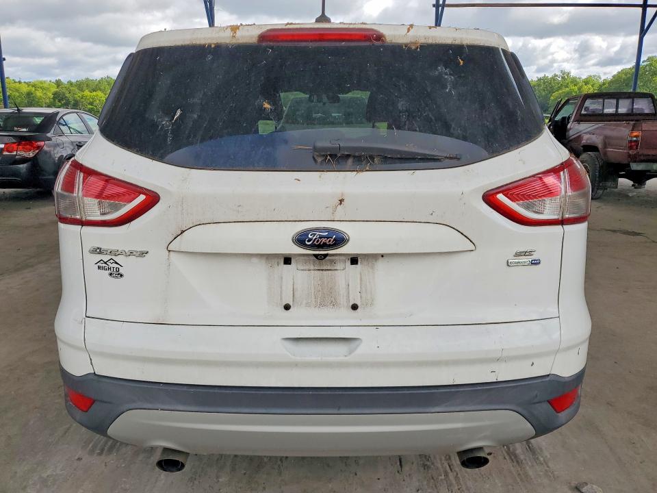 2014 Ford Escape VIN 1FMCU9GXXEUE01205 COPART salvage auction — MINOR DENT/SCRATCHES, Ga - Certificate Of Title, sold $250 on 2026-07-02 (photo 6)