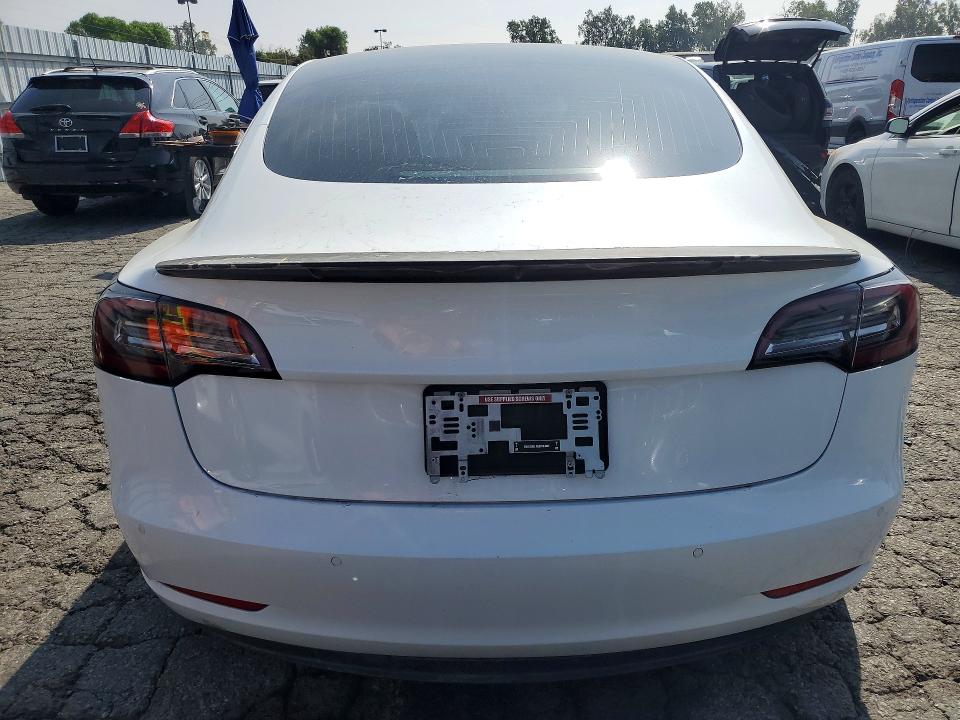2019 Tesla VIN 5YJ3E1EB4KF388532 COPART salvage auction — SIDE, Ca - Salvage Certificate, sold $6,100 on 2026-07-16 (photo 6)