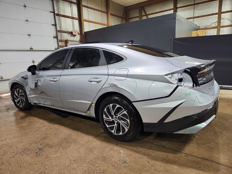 2026 Hyundai Sonata hybrid VIN KMHL24JJXTA164386 COPART salvage auction — SIDE, Fl - Certificate Of Title, sold $10,900 on 2026-07-20 (photo 2)