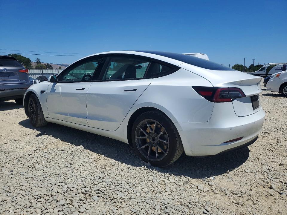 2021 Tesla Model 3 VIN 5YJ3E1EA9MF876949 COPART salvage auction — SIDE, CA - SALVAGE CERTIFICATE, sold $7,800 on 2026-07-16 (photo 2)