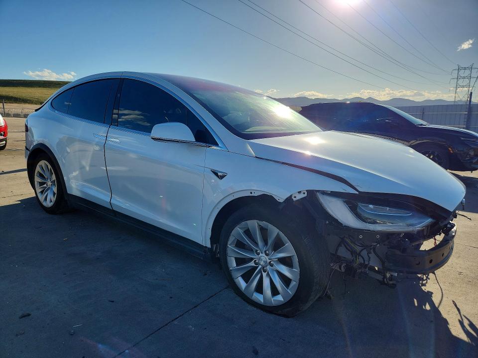 2017 Tesla Model x VIN 5YJXCBE22HF044722 COPART salvage auction — REAR END, Co - Public - Salvage Title, sold $3,800 on 2026-08-03 (photo 4)