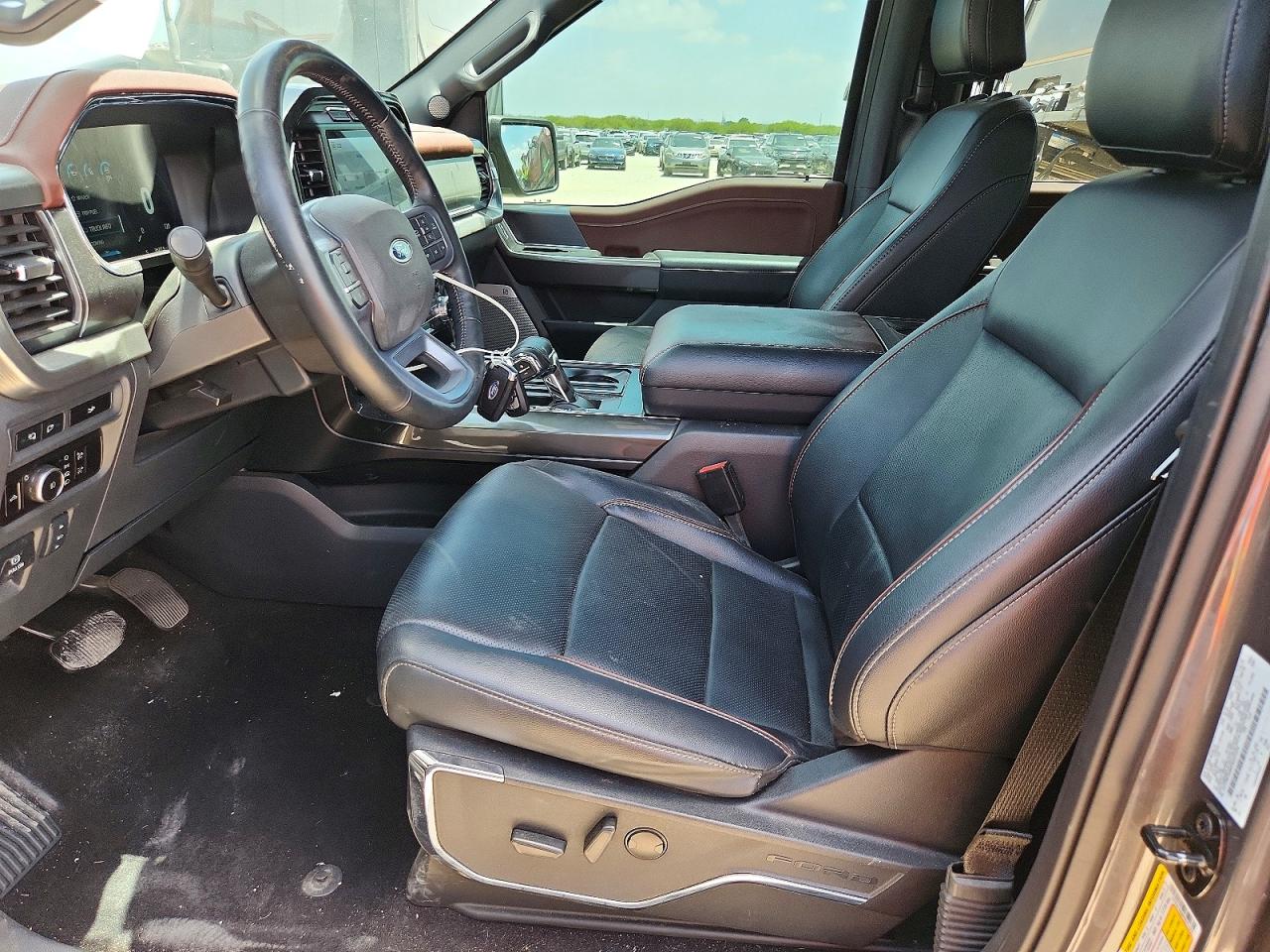 2023 Ford F-150 Lightning VIN 1FTFW1E86PKD71370 COPART salvage auction — Water/Flood, TX - SALVAGE TITLE-FLOOD DAMAGE, sold $26,750 on 2026-08-20 (photo 7)