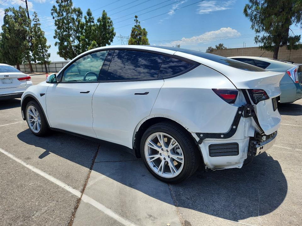 2023 Tesla VIN 7SAYGDEE8PA125107 COPART salvage auction — REAR END, CA - SALVAGE CERTIFICATE, sold $6,700 on 2026-07-28 (photo 2)