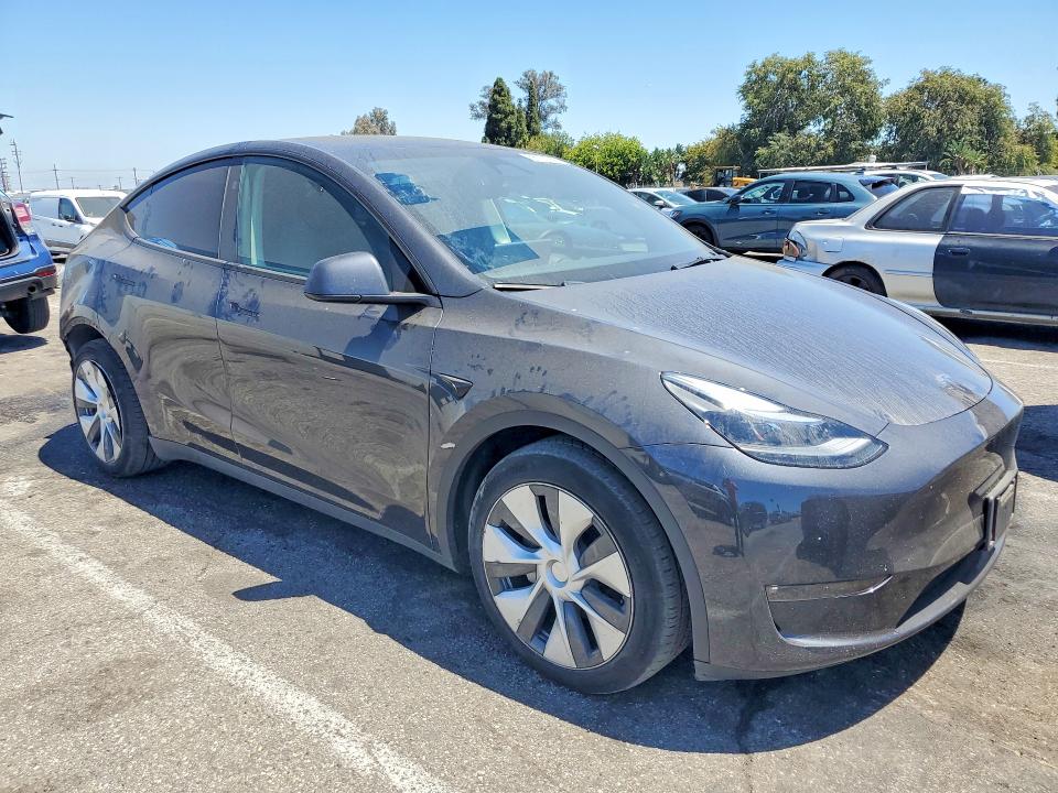 2024 Tesla VIN 7SAYGAEE8RF037534 COPART salvage auction — REAR END, CA - SALVAGE CERTIFICATE, sold $14,100 on 2026-07-24 (photo 4)