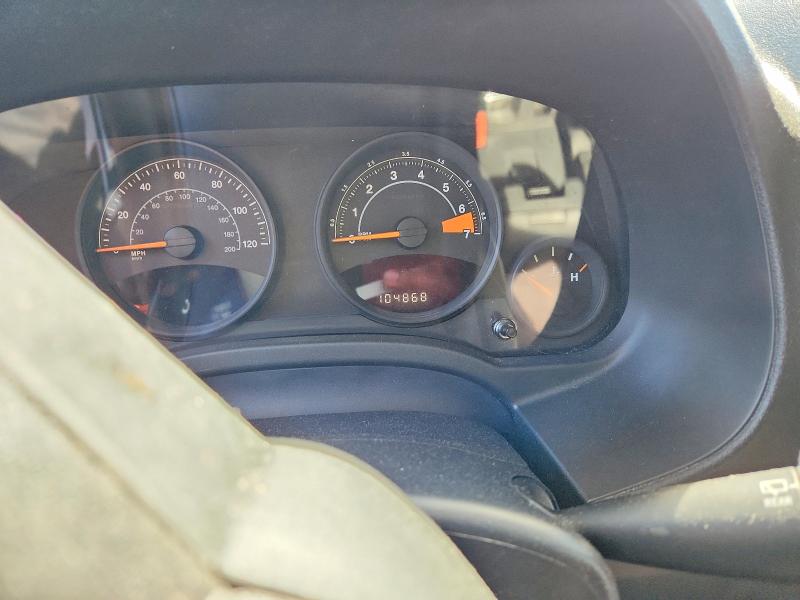 2014 Jeep VIN 1C4NJRFB8ED687647 COPART salvage auction — SIDE, NJ - CERT OF TITLE-SALVAGE (P), sold $900 on 2026-07-02 (photo 9)