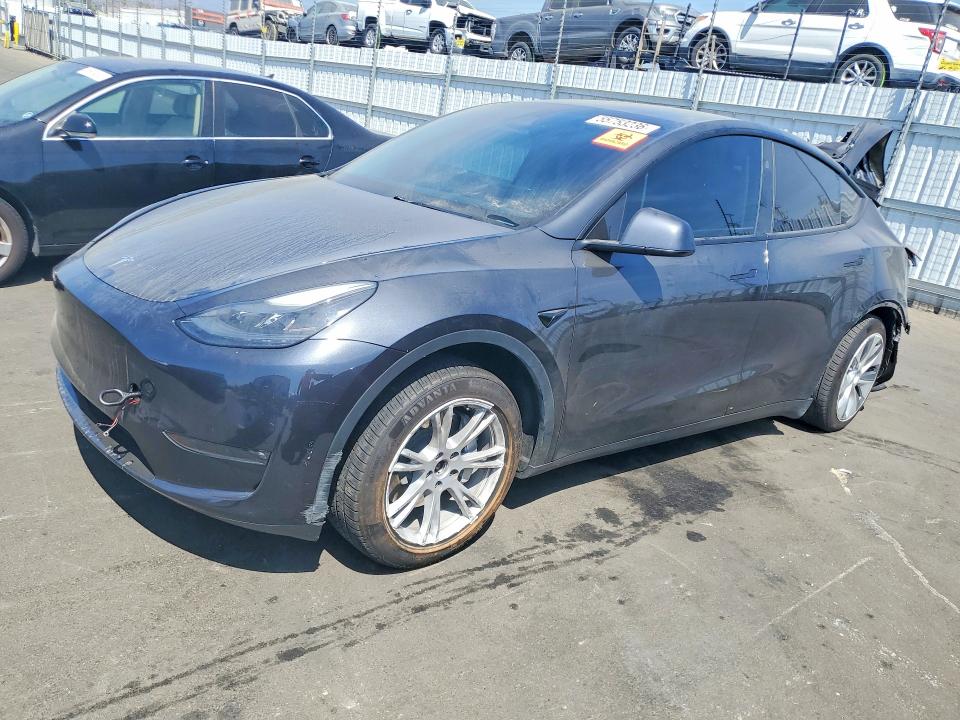 2024 Tesla Model y VIN 7SAYGDEE5RF031434 COPART salvage auction — REAR END, Ca - Salvage Certificate, sold $7,100 on 2026-07-20 (photo 1)