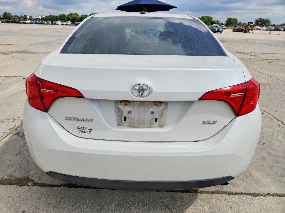 2017 Toyota Corolla VIN 5YFBURHE5HP581577 COPART salvage auction — SIDE, TX - CERTIFICATE OF TITLE, sold $3,850 on 2026-07-27 (photo 6)