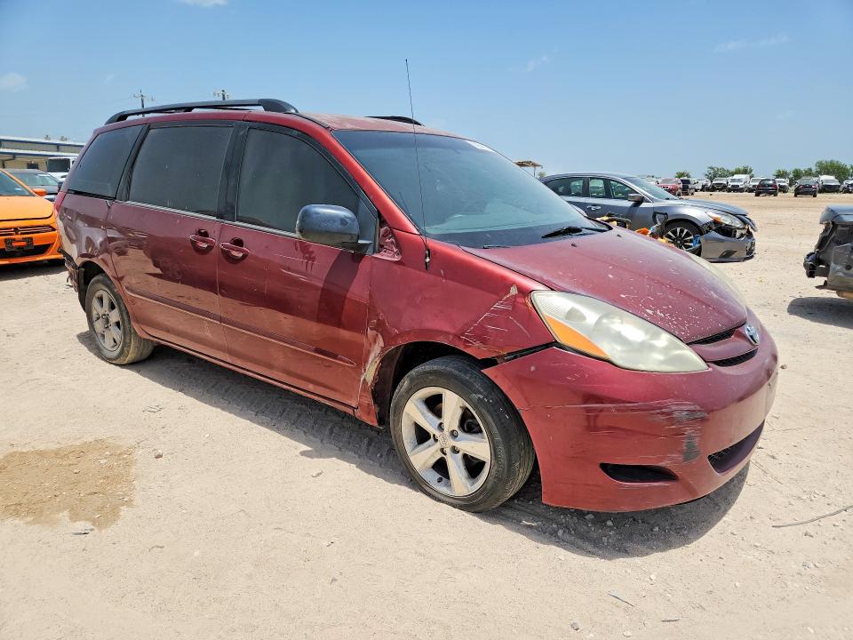 2010 Toyota Sienna VIN 5TDKK4CC6AS331051 COPART salvage auction — REAR END, TX - SALVAGE VEHICLE TITLE, sold $800 on 2026-07-30 (photo 4)
