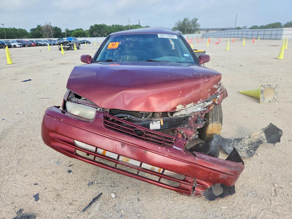 1999 Toyota Camry VIN 4T1BG28K4XU443000 COPART salvage auction — REAR END, TX - SALVAGE VEHICLE TITLE, sold $40 on 2026-07-09 (photo 5)