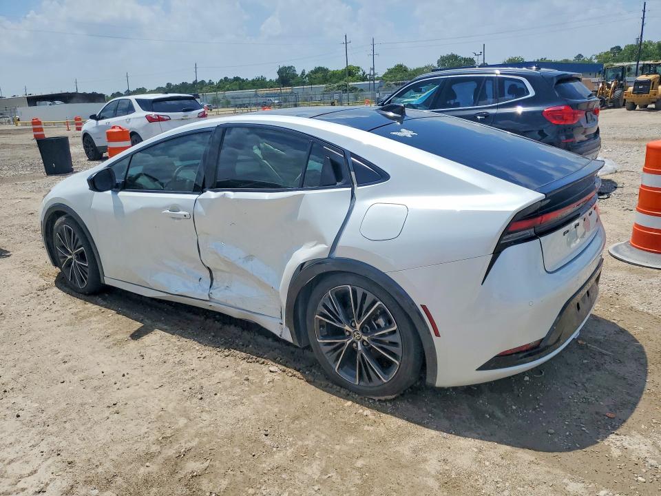 2023 Toyota Prius VIN JTDACAAU0P3011687 COPART salvage auction — SIDE, TX - SALVAGE VEHICLE TITLE (P), sold $7,000 on 2026-07-23 (photo 2)