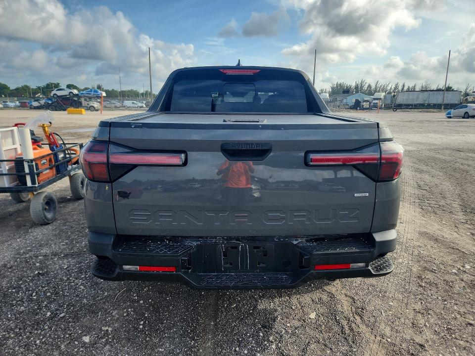 2023 Hyundai Santa cruz VIN 5NTJCDAE5PH060884 COPART salvage auction — FRONT END, Fl - Cert Of Title Slvg Rebuildable, sold $6,400 on 2026-07-14 (photo 6)