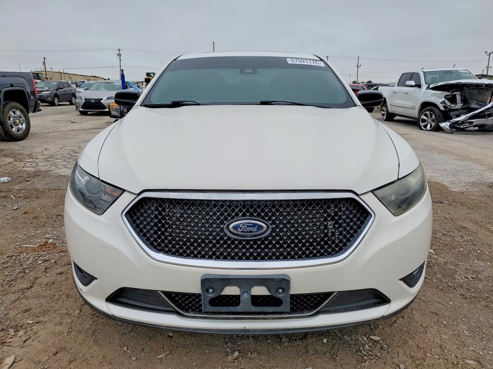 2013 Ford Taurus VIN 1FAHP2KT9DG122683 COPART salvage auction — MECHANICAL, Ok - Certificate Of Title (P), sold $175 on 2026-07-09 (photo 5)