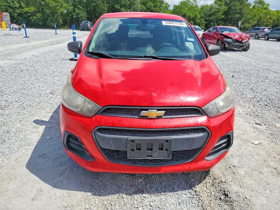 2016 Chevrolet VIN KL8CB6SA4GC585666 COPART salvage auction — SIDE, Salvage Title, sold $125 on 2026-07-27 (photo 5)
