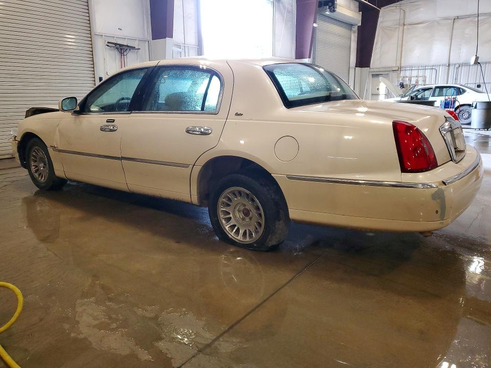 2001 Lincoln TOWN CAR VIN 1LNHM83W71Y701168 COPART salvage auction — FRONT END, MN - CERT OF TITLE-PRIOR SALVAGE, sold $70 on 2026-07-27 (photo 2)