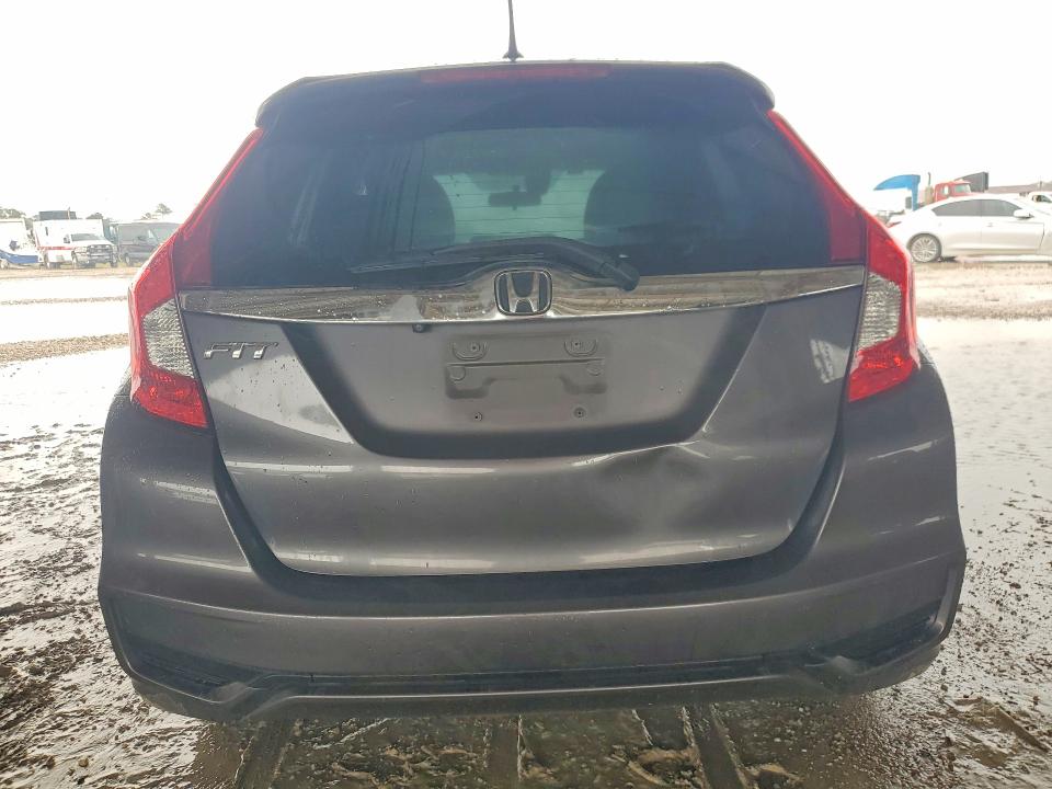2018 Honda Fit VIN 3HGGK5H89JM719876 COPART salvage auction — WATER/FLOOD, Tx - Salvage Title-Flood Damage, sold $150 on 2026-08-21 (photo 6)