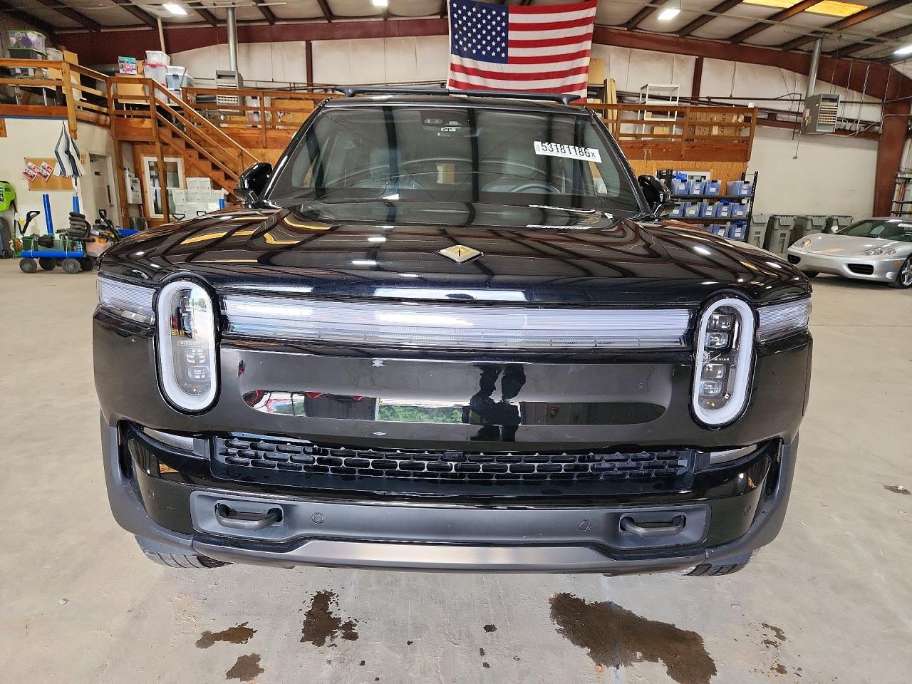2025 Rivian R1S VIN 7PDSGBBA7SN059096 COPART salvage auction — Rear End, GA - CERT OF TITLE-SALVAGE, sold $31,500 on 2026-07-02 (photo 5)