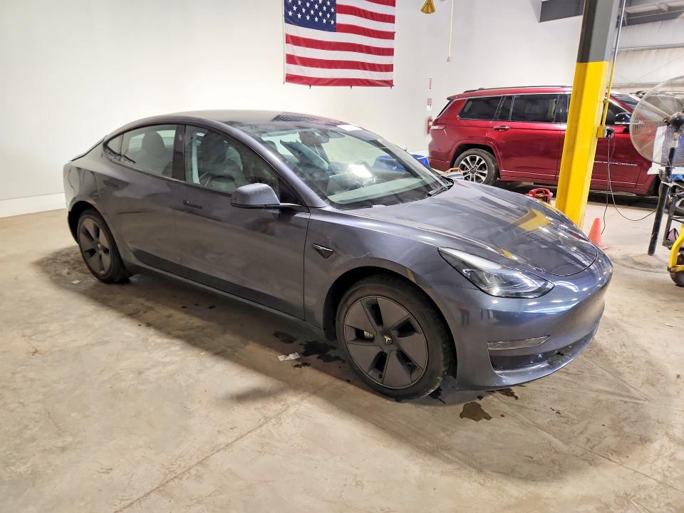 2023 Tesla Model 3 VIN 5YJ3E1EAXPF650908 COPART salvage auction — REAR END, Pa - Certificate Of Salvage, sold $7,600 on 2026-07-15 (photo 4)