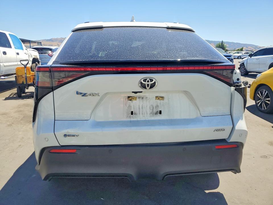 2024 Toyota Bz4x VIN JTMABACA9RA052209 COPART salvage auction — FRONT END, Ca - Salvage Certificate, sold $8,300 on 2026-07-14 (photo 6)