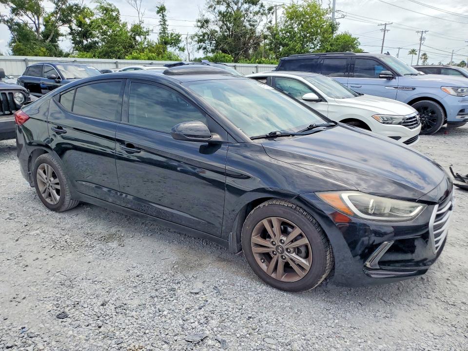 2018 Hyundai VIN KMHD84LFXJU586200 COPART salvage auction — REAR END, FL - CERT OF TITLE SLVG REBUILDABLE, sold $1,950 on 2026-07-14 (photo 4)