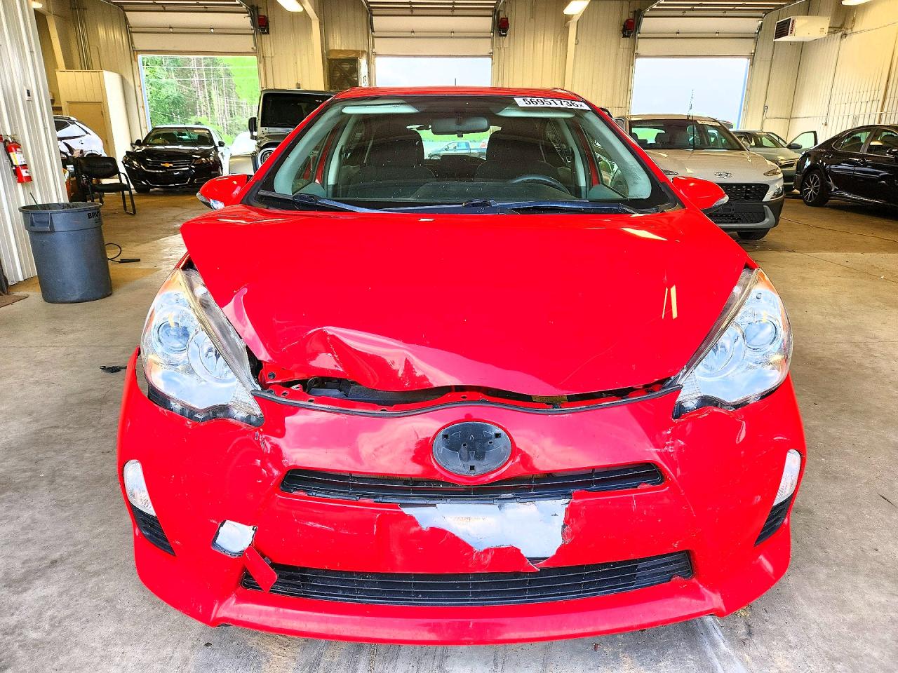 2014 Toyota Prius C VIN JTDKDTB33E1560327 COPART salvage auction — Front End, MN - CERT OF TITLE-PRIOR SALVAGE, sold $1,200 on 2026-07-09 (photo 5)