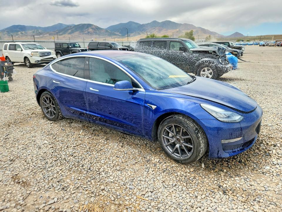 2018 Tesla Model 3 VIN 5YJ3E1EB6JF100928 COPART salvage auction — REAR END, UT - SALVAGE CERTIFICATE, sold $3,100 on 2026-07-31 (photo 4)