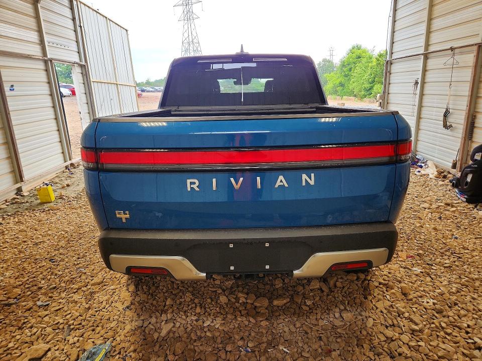 2023 Rivian VIN 7FCTGAAAXPN026117 COPART salvage auction — SIDE, Nc - Salvage Certificate Of Title, sold $8,000 on 2026-07-27 (photo 6)