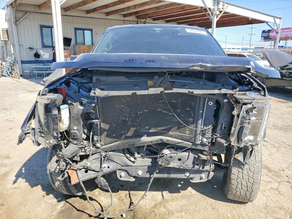 2021 Ford F-150 VIN 1FTMF1C55MKE19808 COPART salvage auction — FRONT END, Ca - Salvage Certificate, sold $10,000 on 2026-07-02 (photo 5)