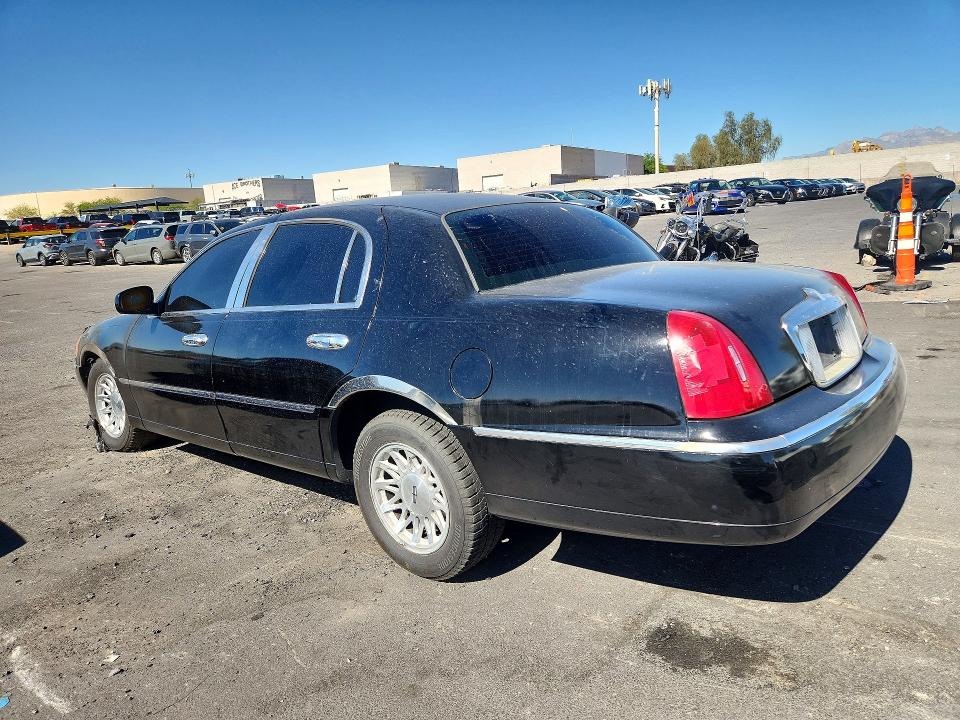 1998 Lincoln TOWN CAR VIN 1LNFM82W9WY669730 COPART salvage auction — ENGINE BURN, Nv - Non-Repairable Vehicle Cert, sold $125 on 2026-07-08 (photo 2)