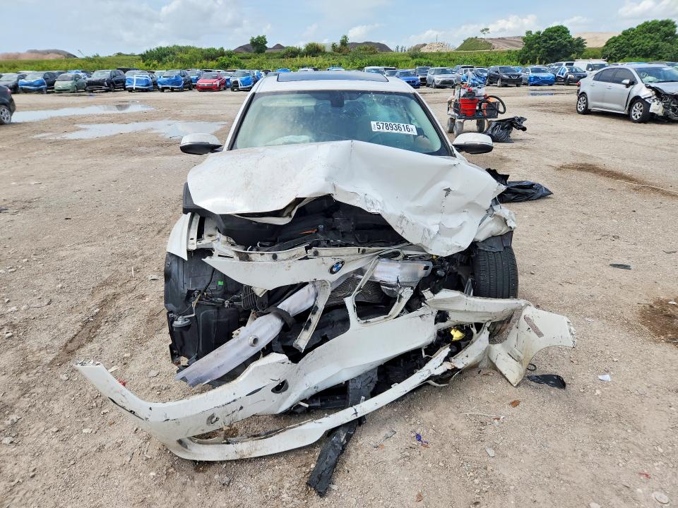 2014 BMW VIN WBA3A5C52EF605105 COPART salvage auction — FRONT END, Fl - Cert Of Title Slvg Rebuildable, sold $10 on 2026-07-28 (photo 5)