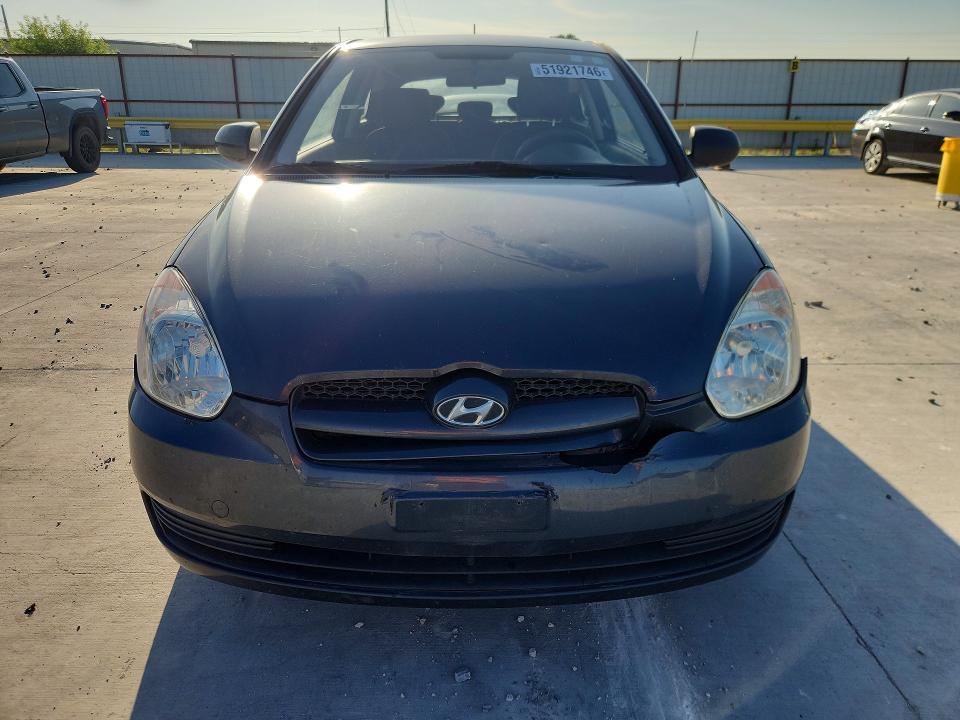 2010 Hyundai Accent VIN KMHCM3AC3AU168555 COPART salvage auction — FRONT END, Tx - Salvage Vehicle Title, sold $175 on 2026-07-28 (photo 5)