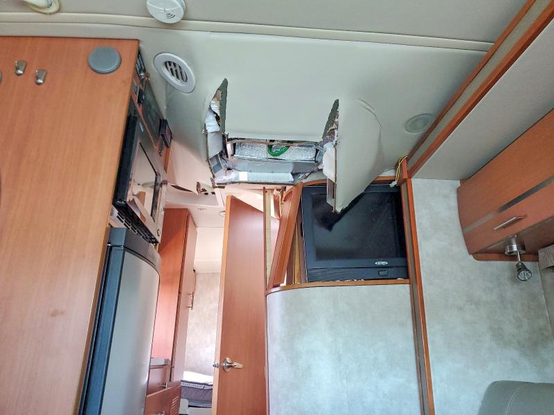 2011 Winnibago VIN WDAPF4CA1A9459904 COPART salvage auction — ROOF, MI - DEALER ONLY CLEAN TITLE, sold $13,100 on 2026-08-11 (photo 9)