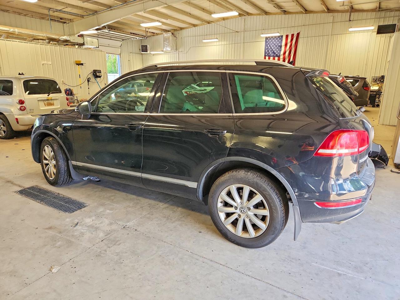 2012 Volkswagen Touareg VIN WVGEK9BPXCD010395 COPART salvage auction — Front End, MN - CERT OF TITLE-PRIOR SALVAGE, sold $900 on 2026-07-02 (photo 2)