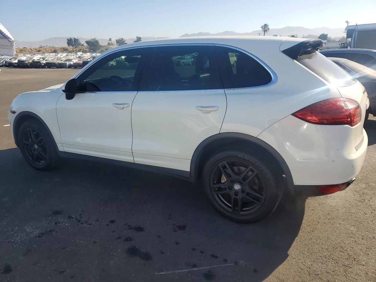 2011 Porsche Cayenne VIN WP1AB2A25BLA42058 COPART salvage auction — Side, FL - DIS/DLR/EXP ONLY CLEAN TITLE, sold $1,150 on 2026-07-08 (photo 2)