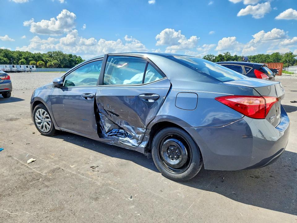 2018 Toyota VIN 5YFBURHE9JP826693 COPART salvage auction — SIDE, Fl - Cert Of Title Slvg Rebuildable, sold $4,050 on 2026-07-06 (photo 2)